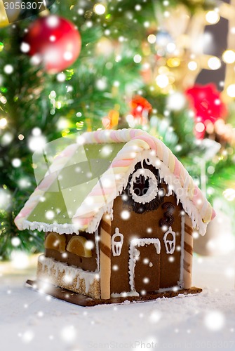 Image of closeup of beautiful gingerbread house at home