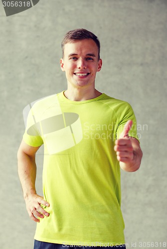 Image of smiling man in gym