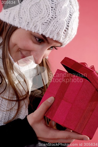 Image of Girl looking into gift