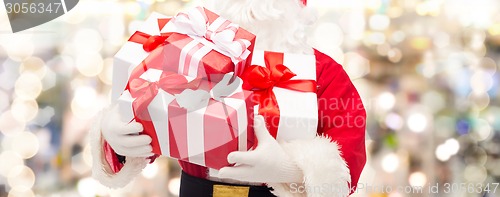 Image of close up of santa claus with gift box