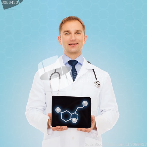 Image of smiling male doctor showing tablet pc screen