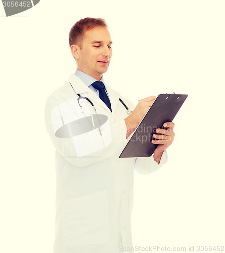 Image of smiling male doctor with clipboard and stethoscope