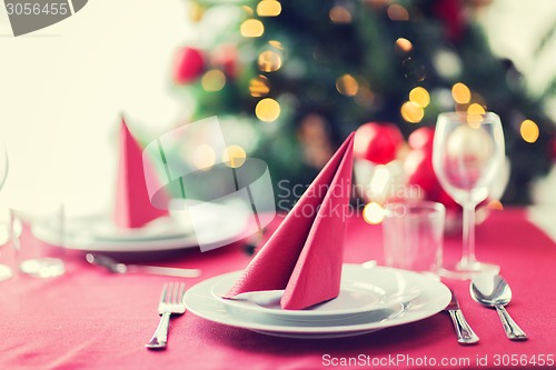 Image of room with christmas tree and decorated table