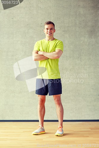 Image of smiling man in gym