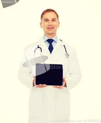 Image of smiling male doctor with tablet pc