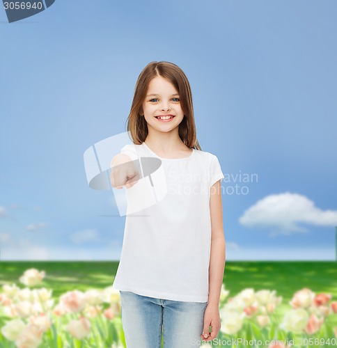 Image of smiling little girl in white blank t-shirt