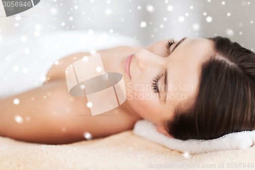 Image of beautiful young woman in spa