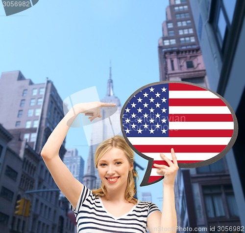 Image of smiling woman with text bubble of american flag