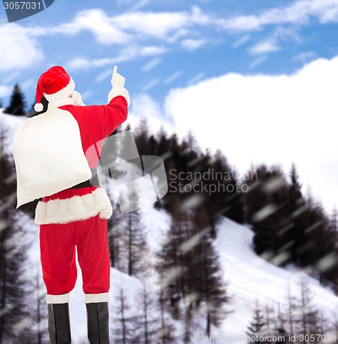 Image of man in costume of santa claus with bag