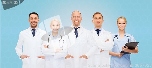 Image of group of doctors with stethoscopes and clipboard