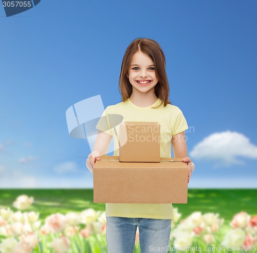 Image of smiling little girl in white blank t-shirt