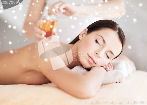 Image of beautiful young woman in spa