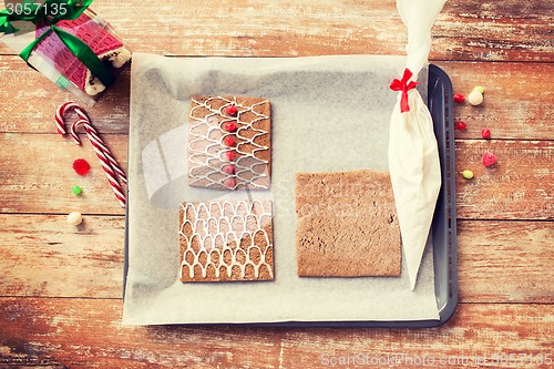 Image of closeup of gingerbread house details on pan