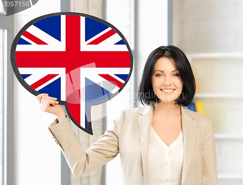 Image of smiling woman with text bubble of british flag