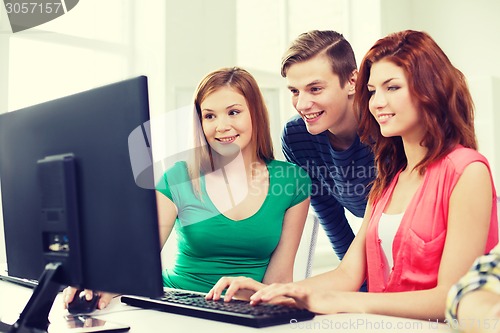 Image of group of smiling students having discussion