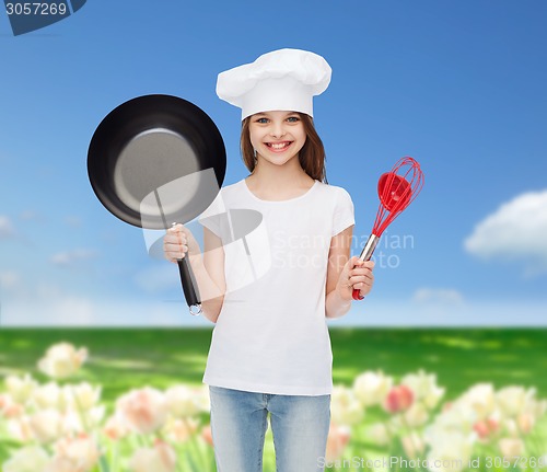 Image of smiling little girl in white blank t-shirt