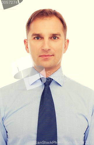 Image of portrait of serious businessman