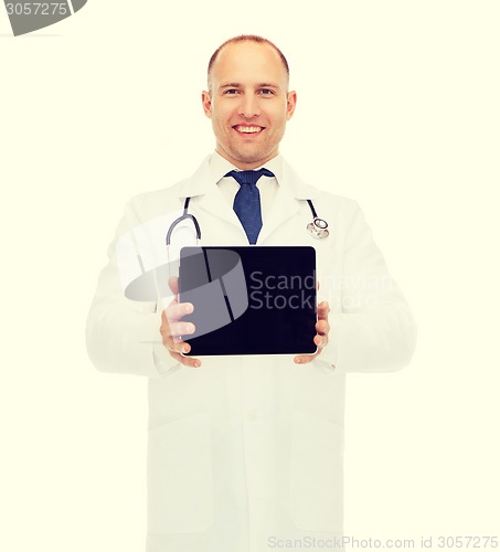 Image of smiling male doctor with tablet pc