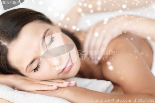 Image of beautiful young woman in spa