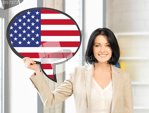 Image of smiling woman with text bubble of american flag