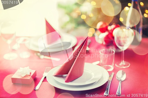 Image of room with christmas tree and decorated table