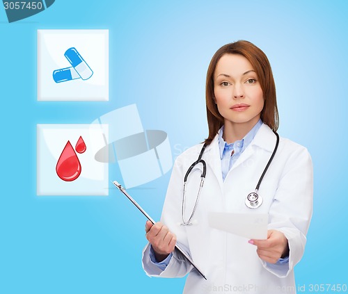 Image of smiling doctor or nurse pointing to pills icon