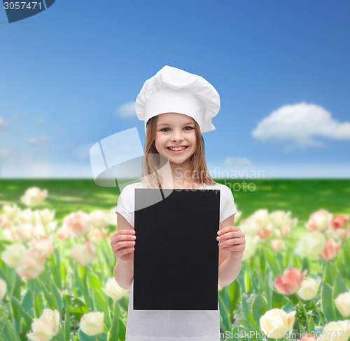 Image of little cook or baker with blank black paper