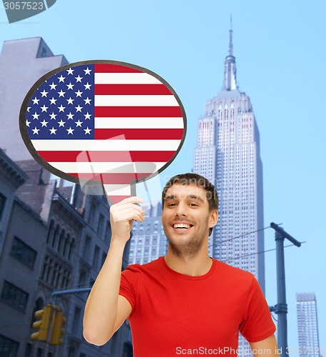 Image of smiling man with text bubble of american flag