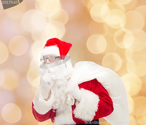 Image of man in costume of santa claus with bag