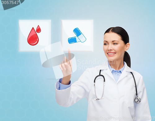 Image of smiling doctor or nurse pointing to pills icon