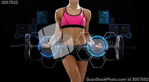 Image of sporty woman exercising with barbell