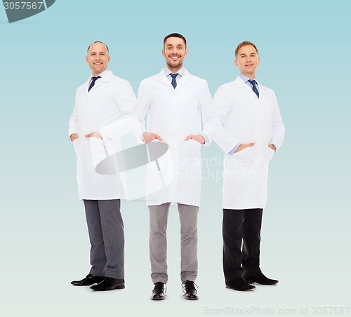 Image of smiling male doctors in white coats