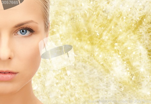 Image of beautiful young woman half face