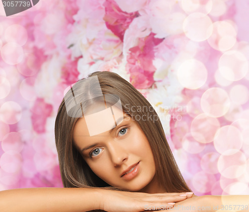 Image of beautiful young woman with bare shoulders