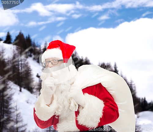 Image of man in costume of santa claus with bag