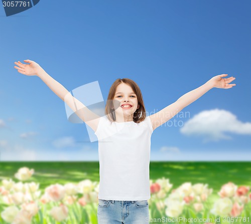 Image of smiling little girl in white blank t-shirt