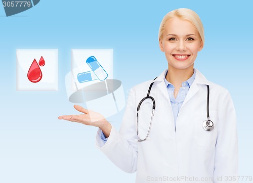 Image of smiling doctor or nurse pointing to pills icon