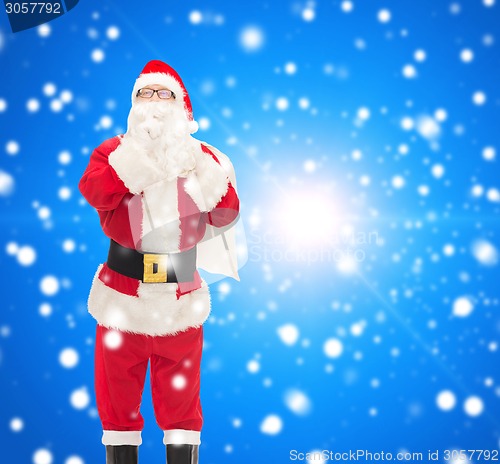 Image of man in costume of santa claus with bag