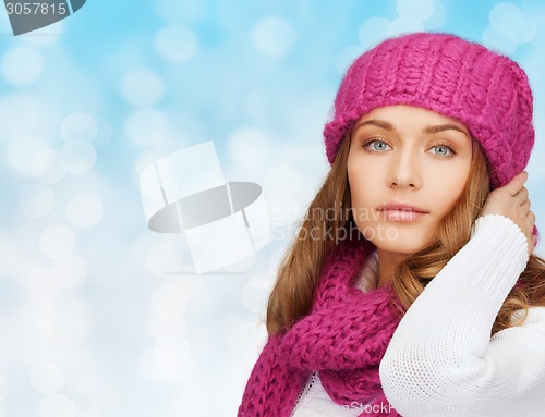 Image of smiling young woman in winter clothes