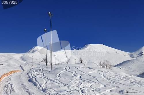 Image of Winter mountains and ski slope at nice sun day