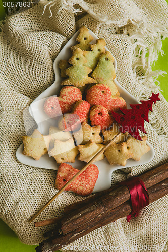 Image of Christmas cookies with festive decoration