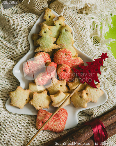 Image of Christmas cookies with festive decoration