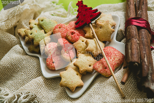 Image of Christmas cookies with festive decoration