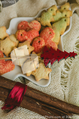 Image of Christmas cookies with festive decoration