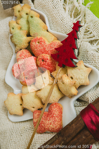 Image of Christmas cookies with festive decoration
