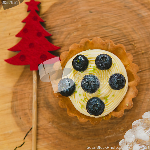 Image of Traditional Christmas cake. Warm colors.