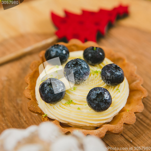 Image of Traditional Christmas cake. Warm colors.