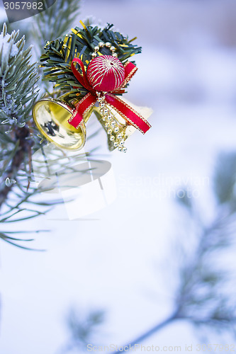 Image of Vertical shot of christmas decoration on natural fir 