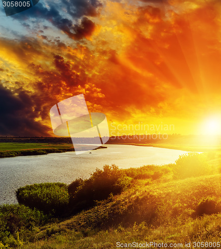 Image of fantastic red sunset over river