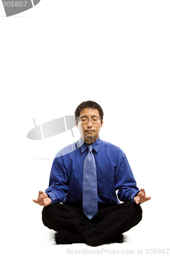 Image of Meditating businessman